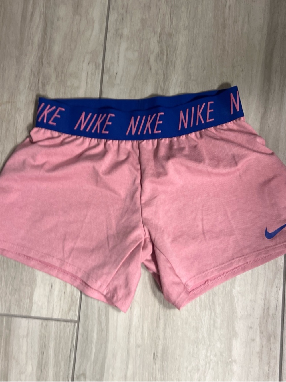 Nike Pink Athletic Shorts with Blue Logo Waistband